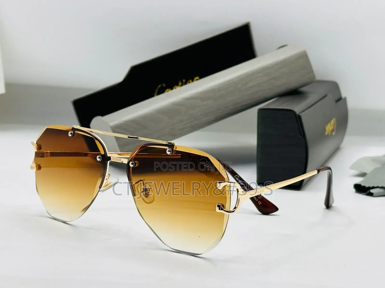 CARTIER Luxury Rimless Aviator Sunglasses a Gold-Tone Metal Frame