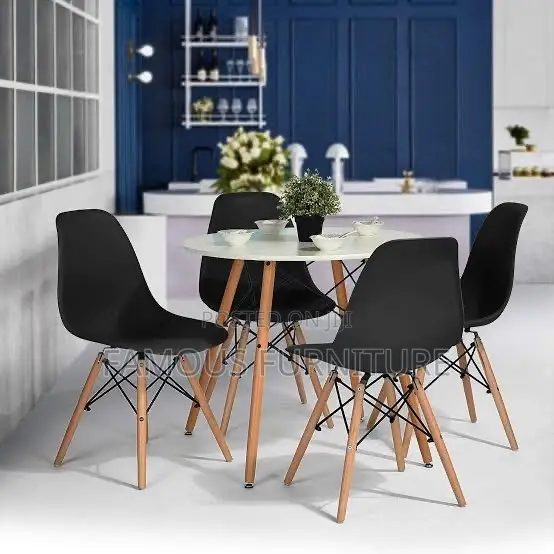 Mid-Century Modern Round Dining Set Featuring a Smooth White Table