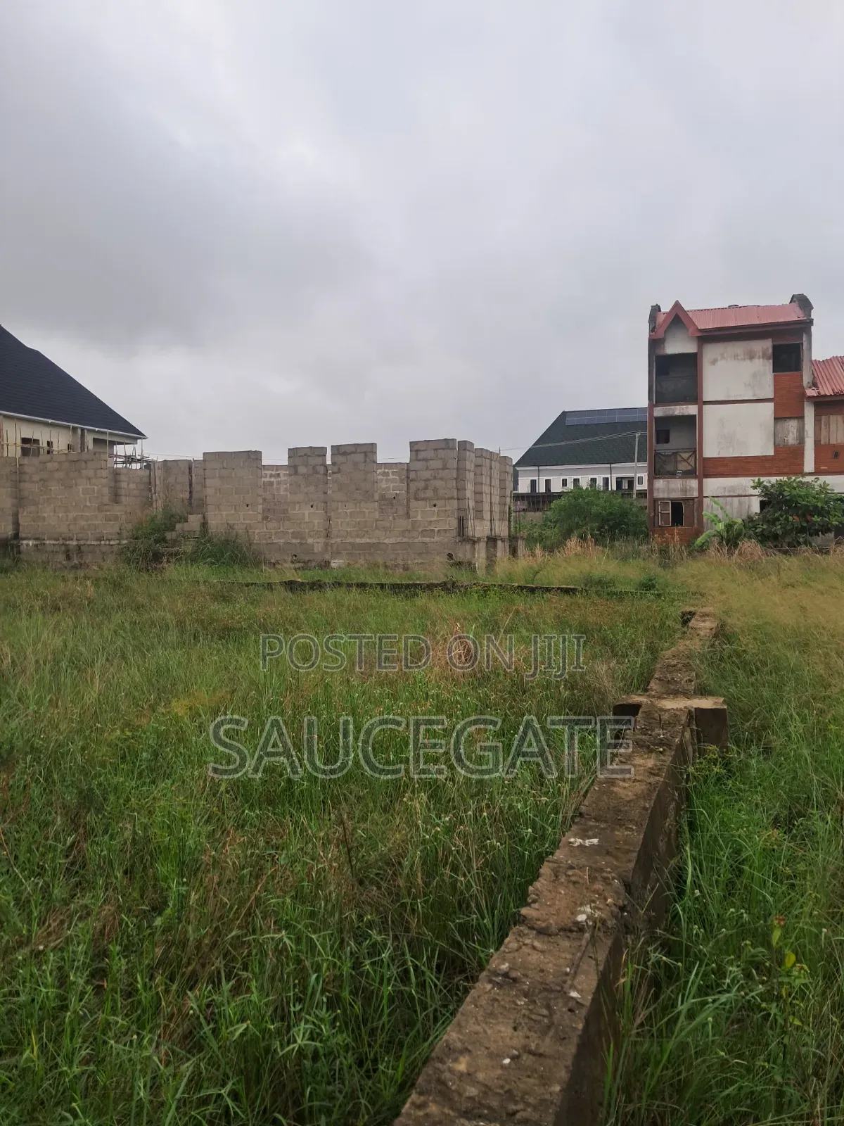 Dry Land Nasco Estate SatelliteTown Global C of O No Omonile