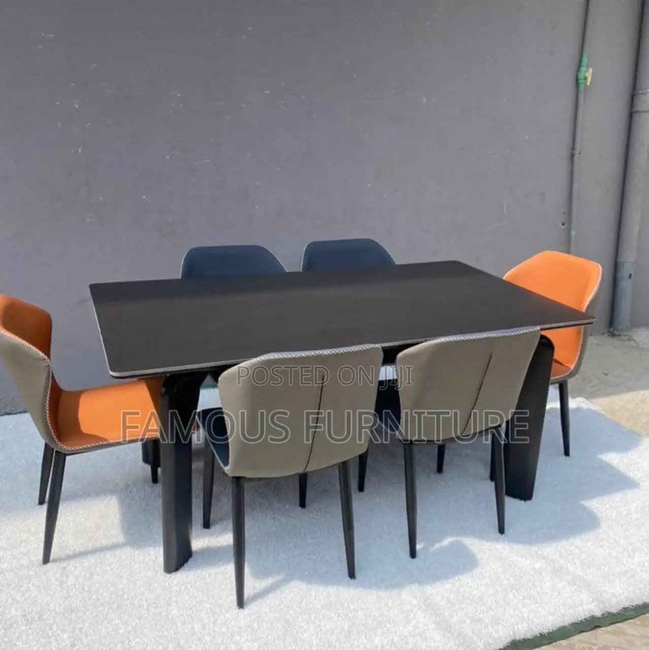 This Appears to Be a Modern 6-Seater Dining Set Featuring a Dark