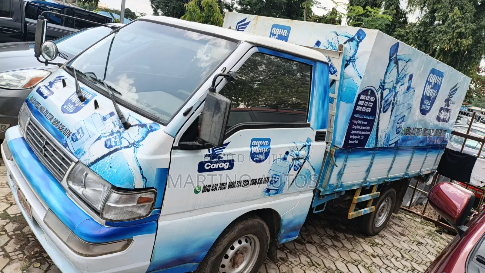 A Mini Truck Mitsubishi in a Very Perfect Condition.