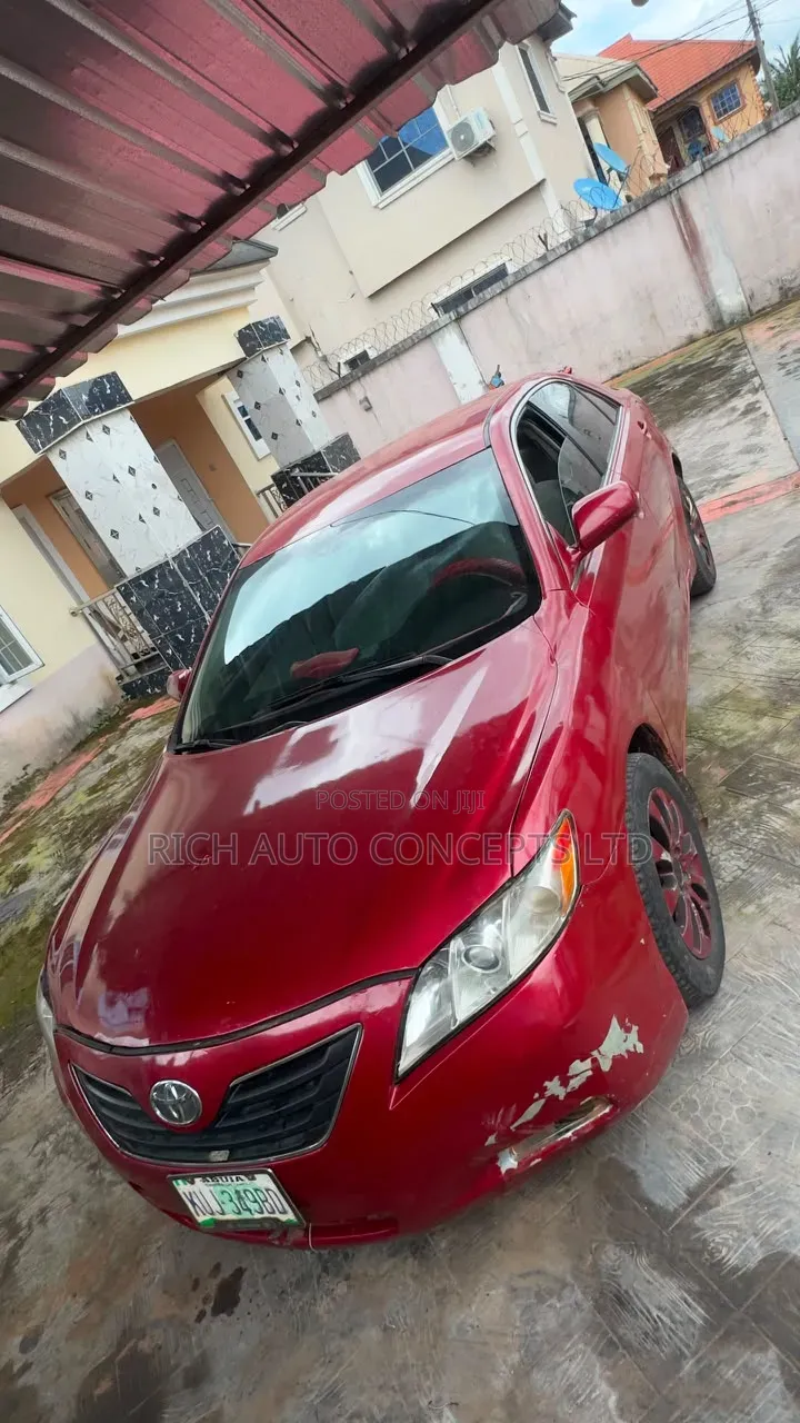 Toyota Camry Base 4dr Sedan (2.5L 4cyl 6M) 2010 Red
