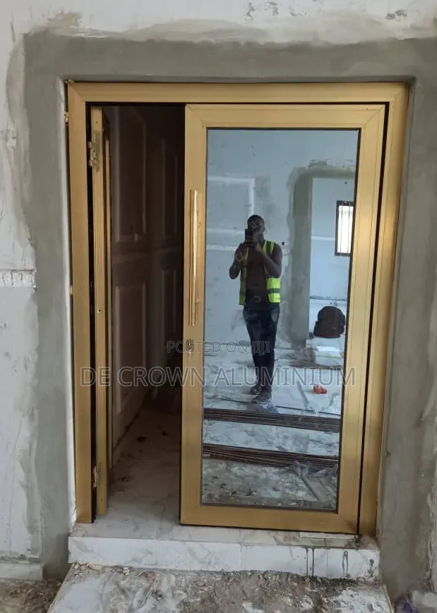 Gold Aluminium Swing Door With Reflective Glass | Modern Entrance Door