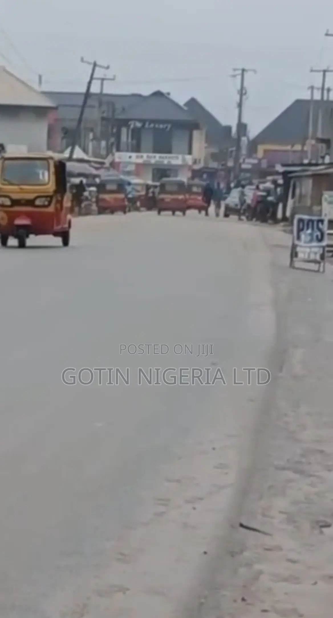 100ft × 200ft Commercial Land for Sale on Ogunmwenyin Tarred Road