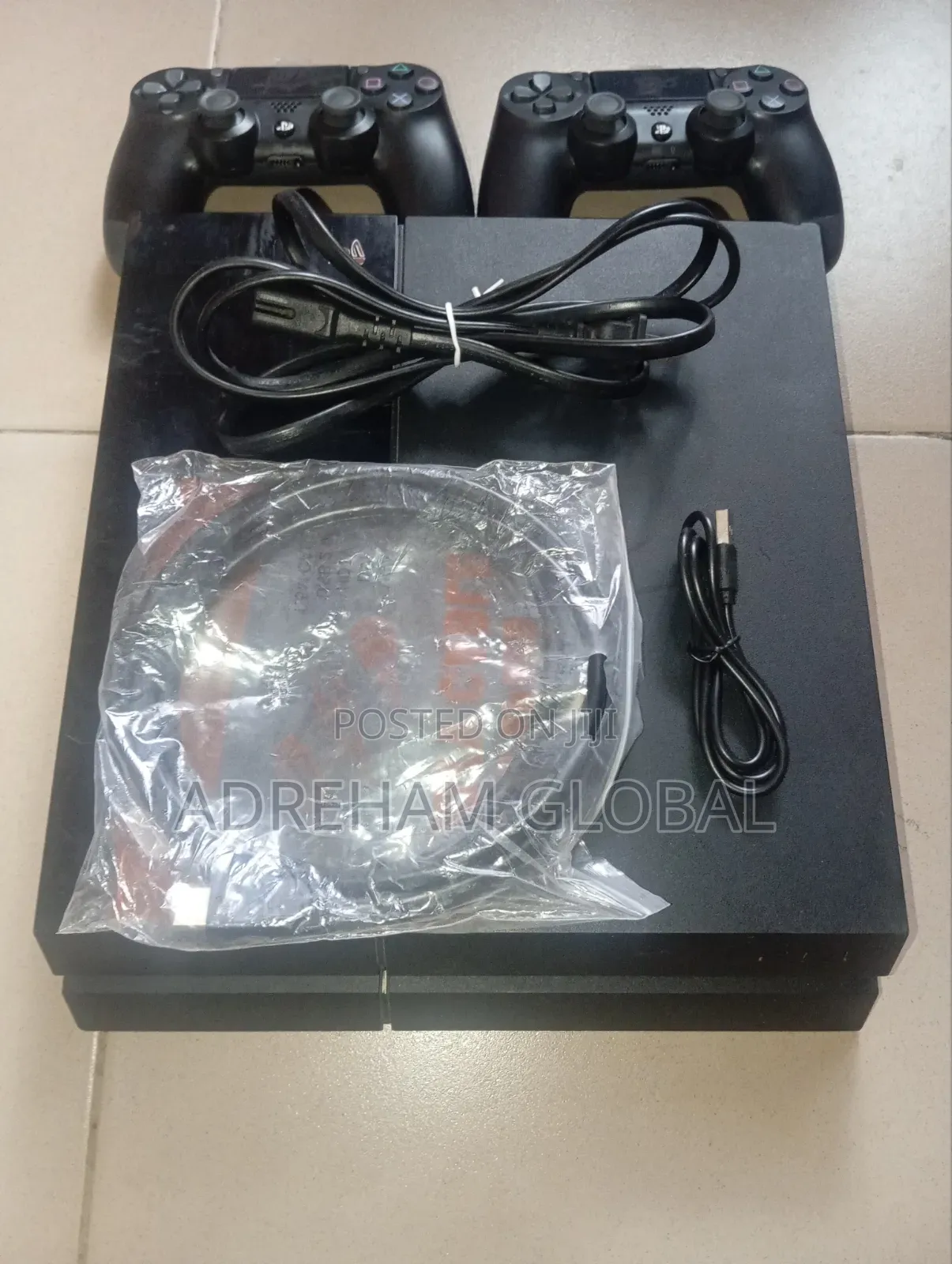 UK Used Sony PS4 With Games Installed and 2 Pads With Power USB Cord