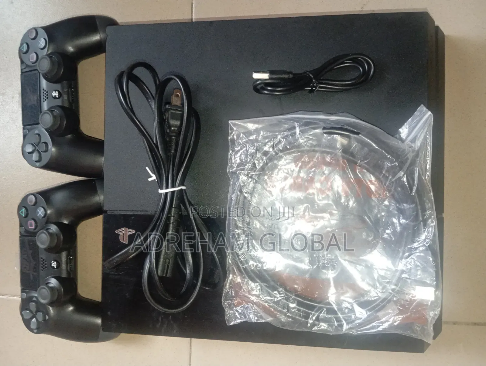 UK Used Sony PS4 With Games Installed and 2 Pads With Power USB Cord