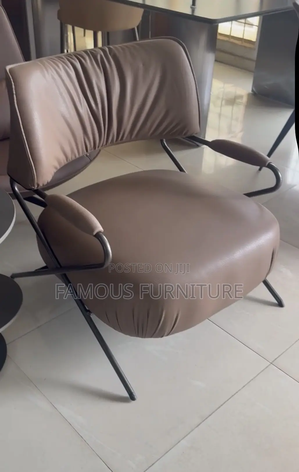 This Is a Modern Leather Accent Lounge Chair Featuring Distinctive
