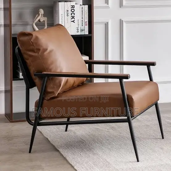 Modern Leather Accent Armchair Featuring a Brown Upholstered Cushion