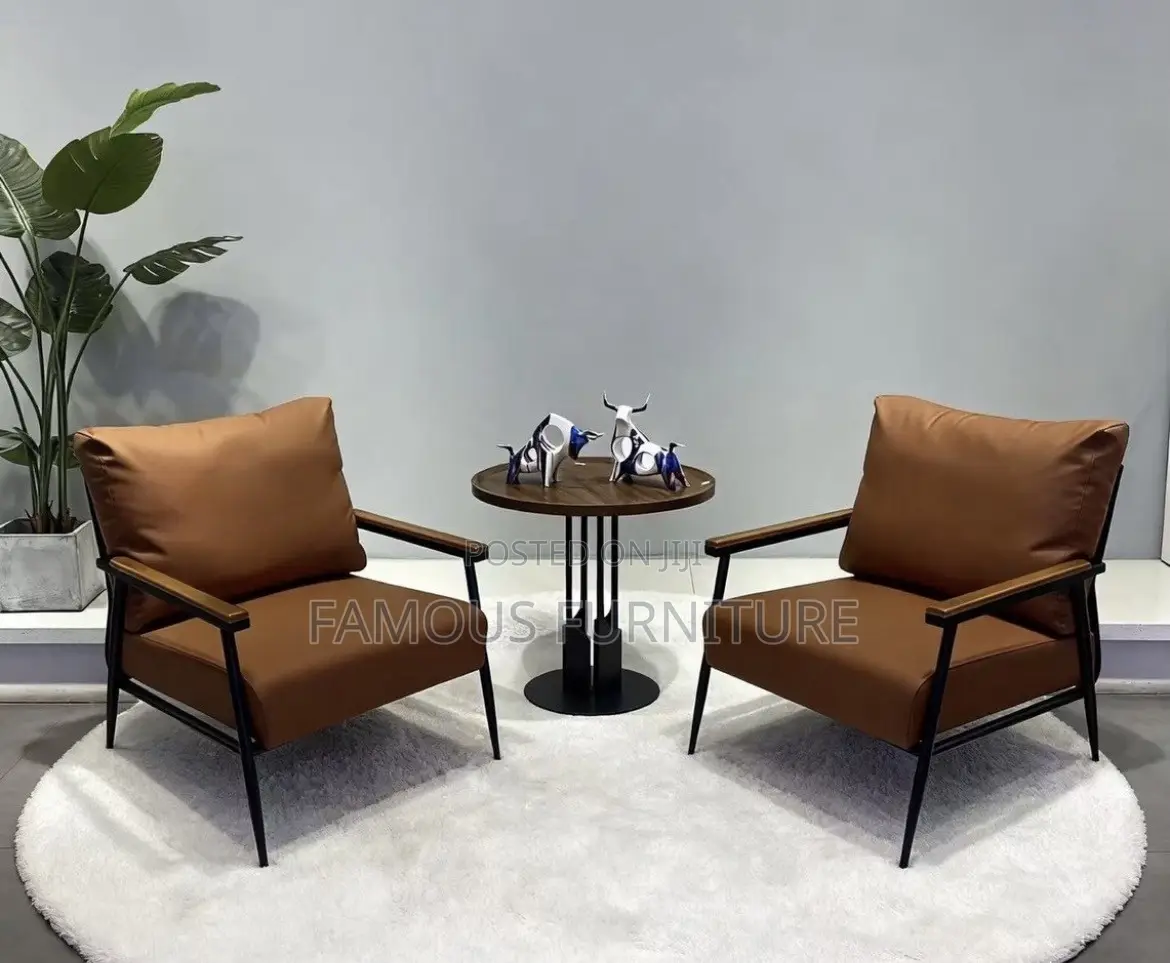 Modern Leather Accent Armchair Featuring a Brown Upholstered Cushion