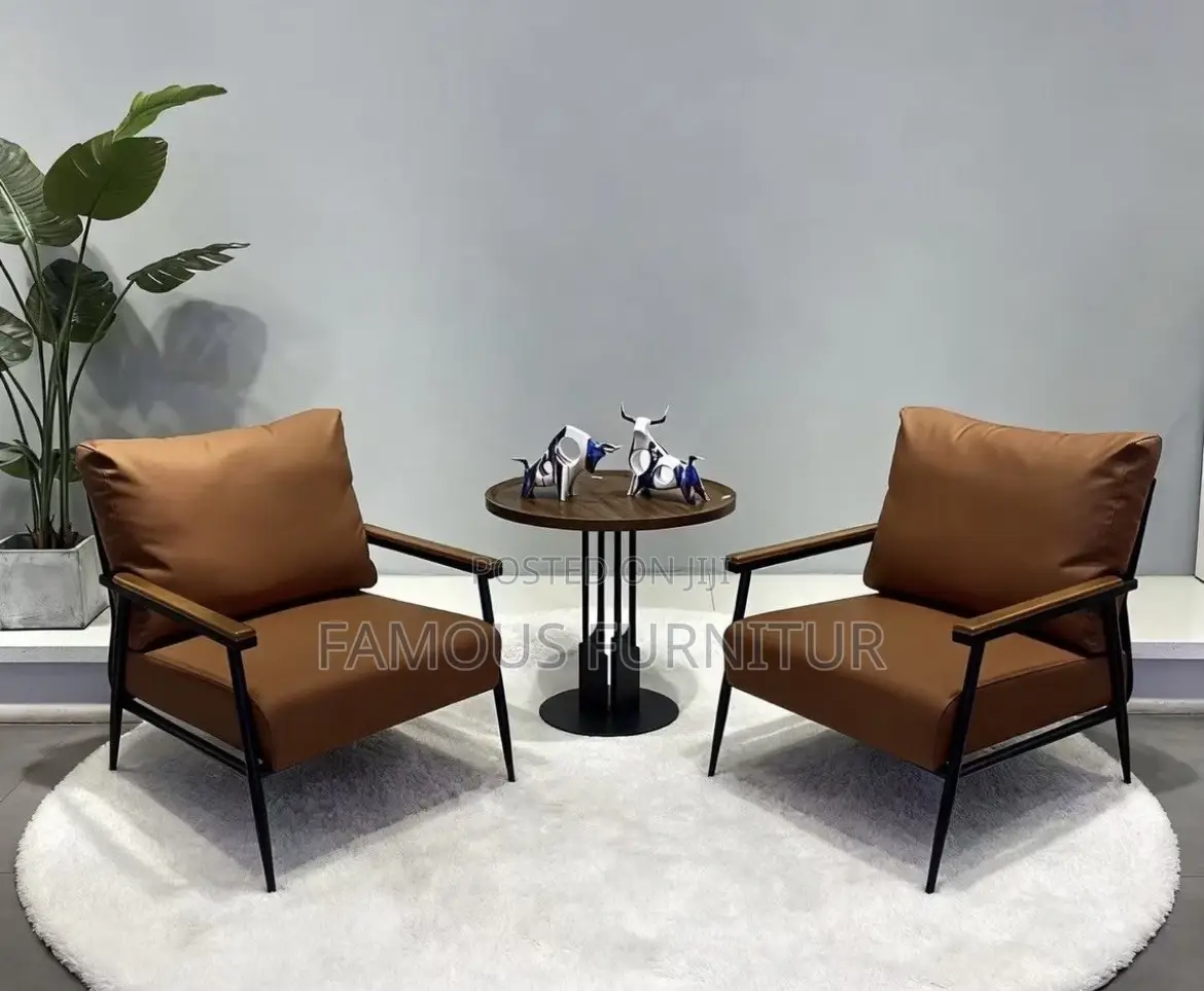 Modern Leather Accent Armchair Featuring a Brown Upholstered Cushion