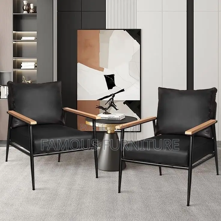 Modern Leather Accent Armchair Featuring a Brown Upholstered Cushion