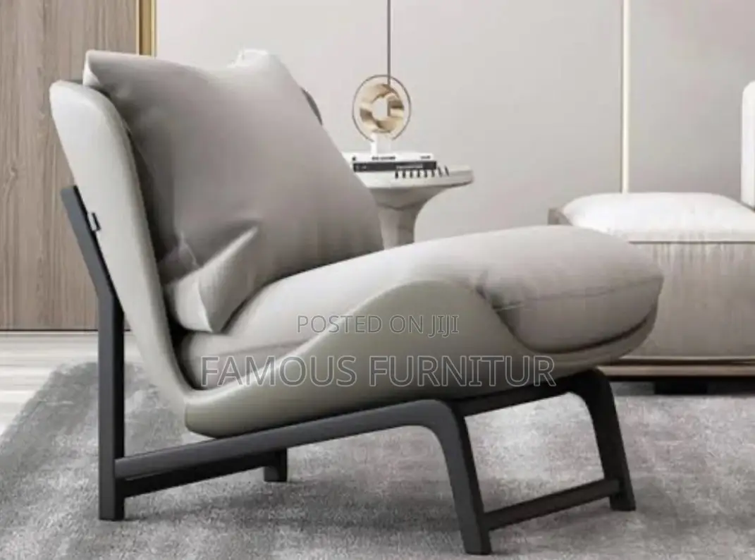 Modern Accent Lounge Chair With a Tan Brown Curved