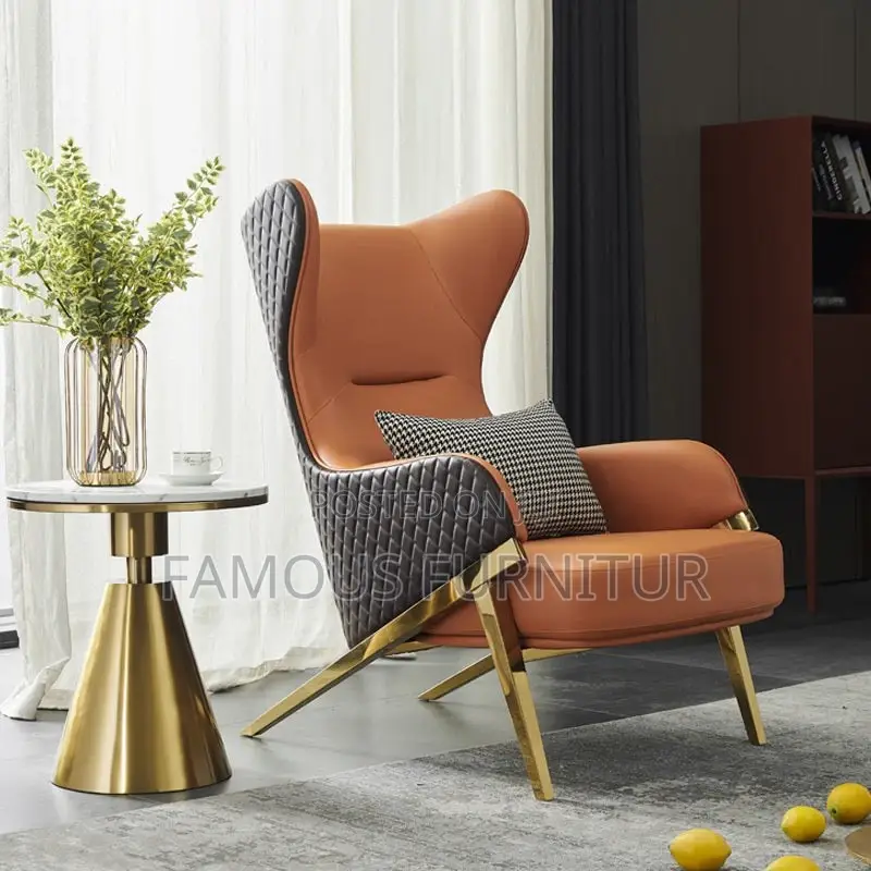 Modern High-Back Wingback Accent Chair Featuring a Vibrant Orange