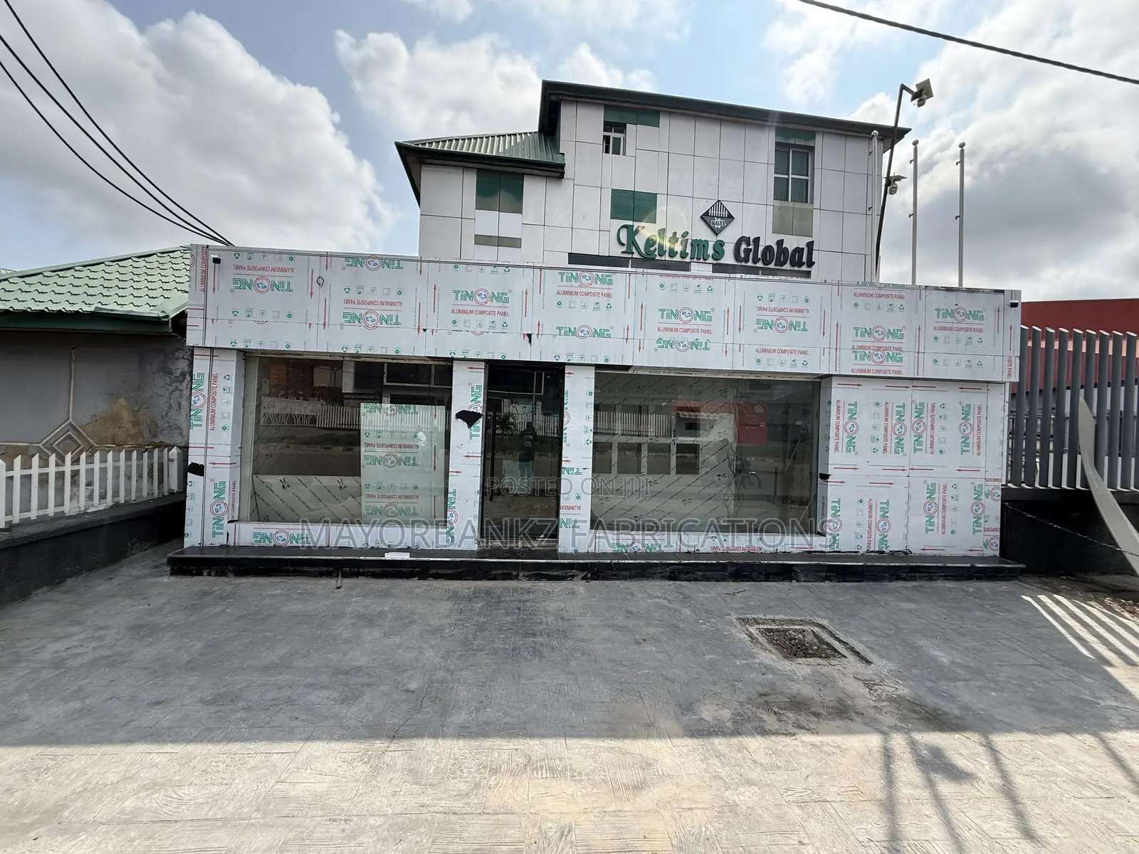 Board Cladding With Framless Swing Door