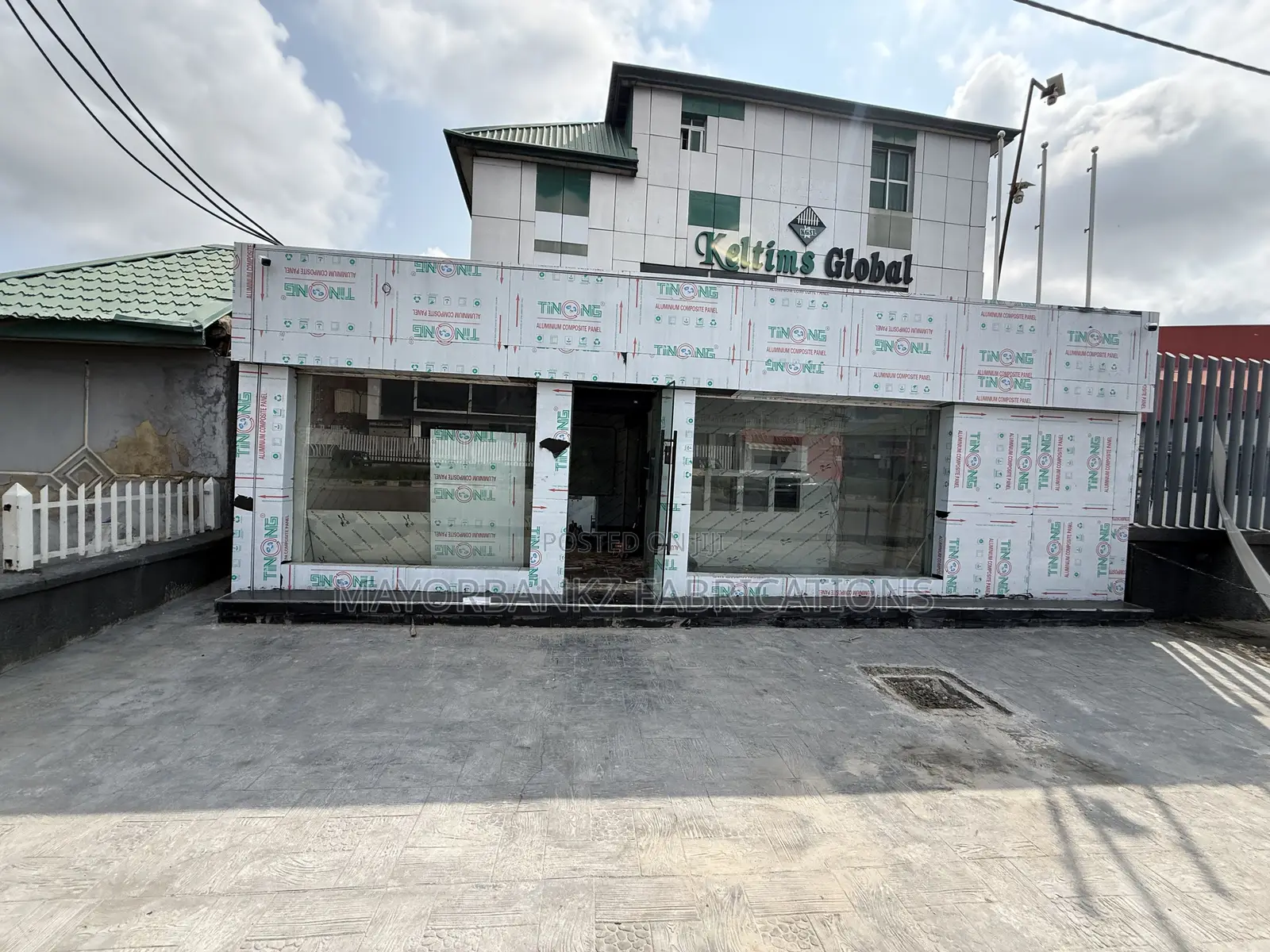 Board Cladding With Framless Swing Door