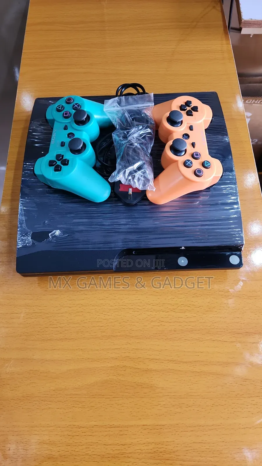 Playstation 3 Slim With 2 Pad and Games