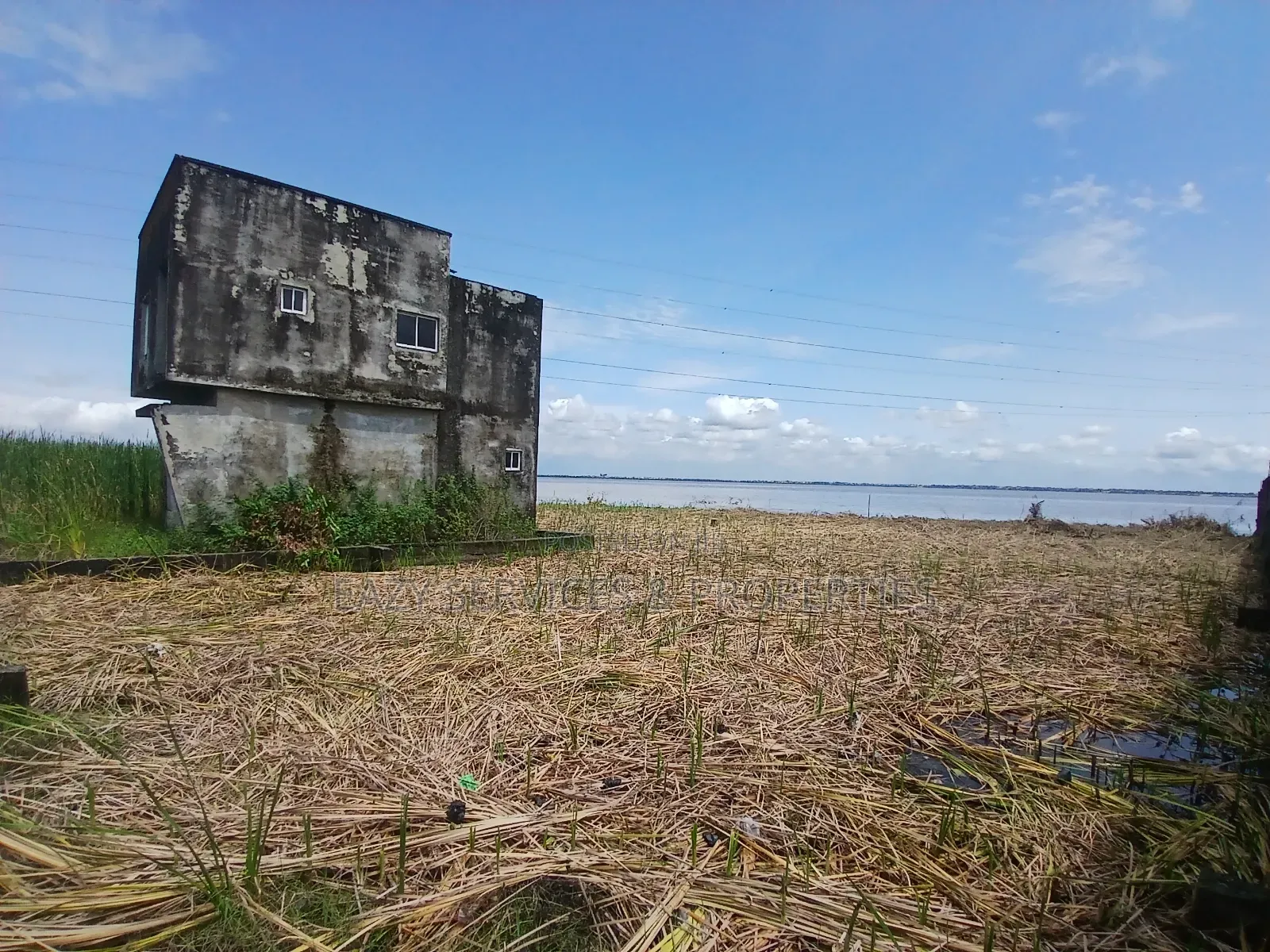 Waterfront Land Measuring 2,398sqm (4plots) in Badore Road, Ajah