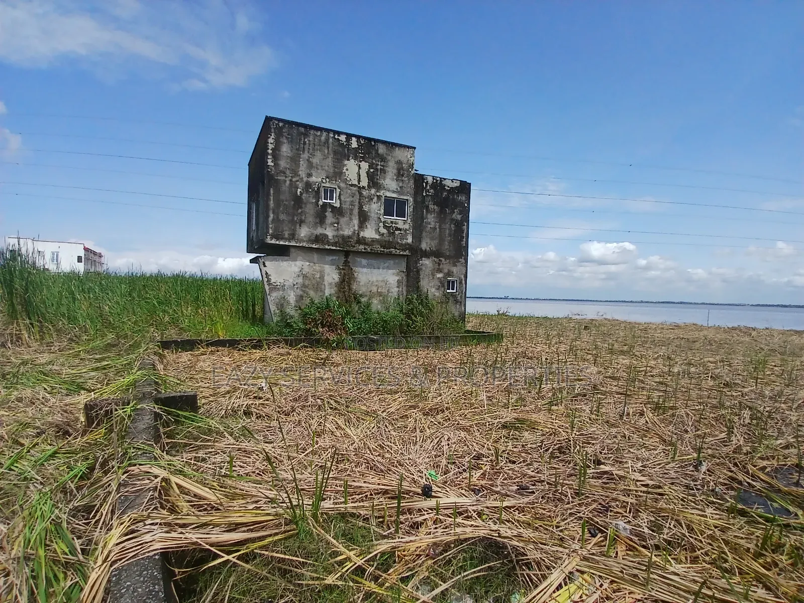 Waterfront Land Measuring 2,398sqm (4plots) in Badore Road, Ajah