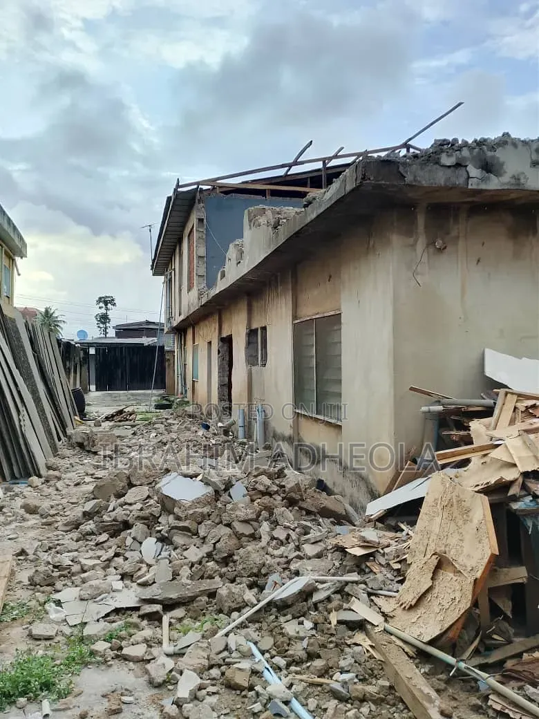 Half Plot of Land With a Demolishable Structure, on a Tared Street
