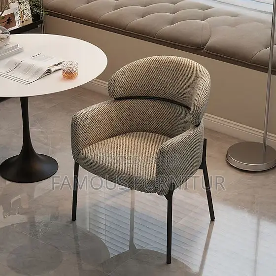 Modern Upholstered Accent Chairs Featuring Curved Wrapar.125,000. Each