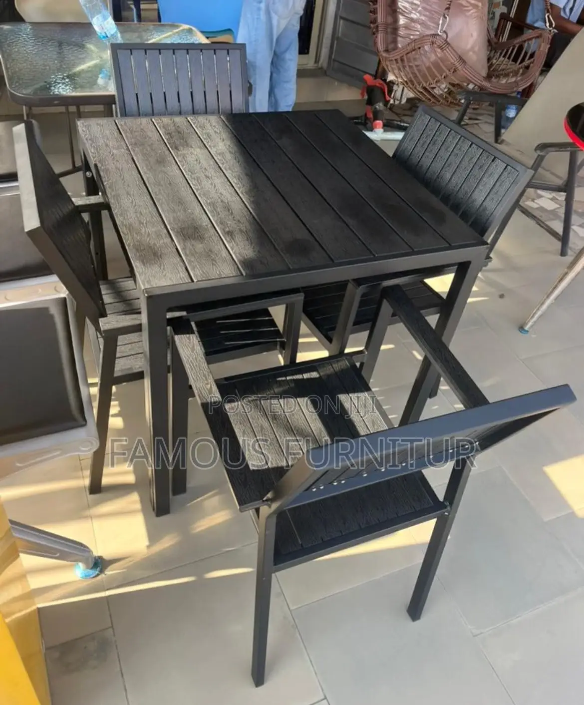 Sleek Black Outdoor Dining Set of Square Slatted Table Chairs