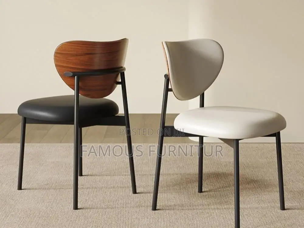 Modern Minimalist Dining Chairs Featuring Curved Wooden Backrests
