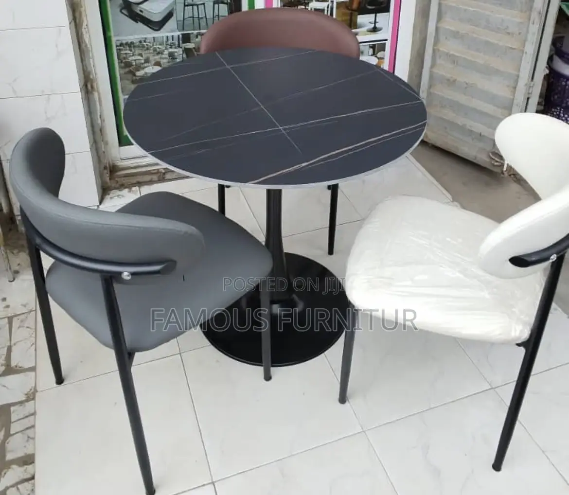 Modern Round Dining and Restaurant Set Featuring a Dark Faux-Marble