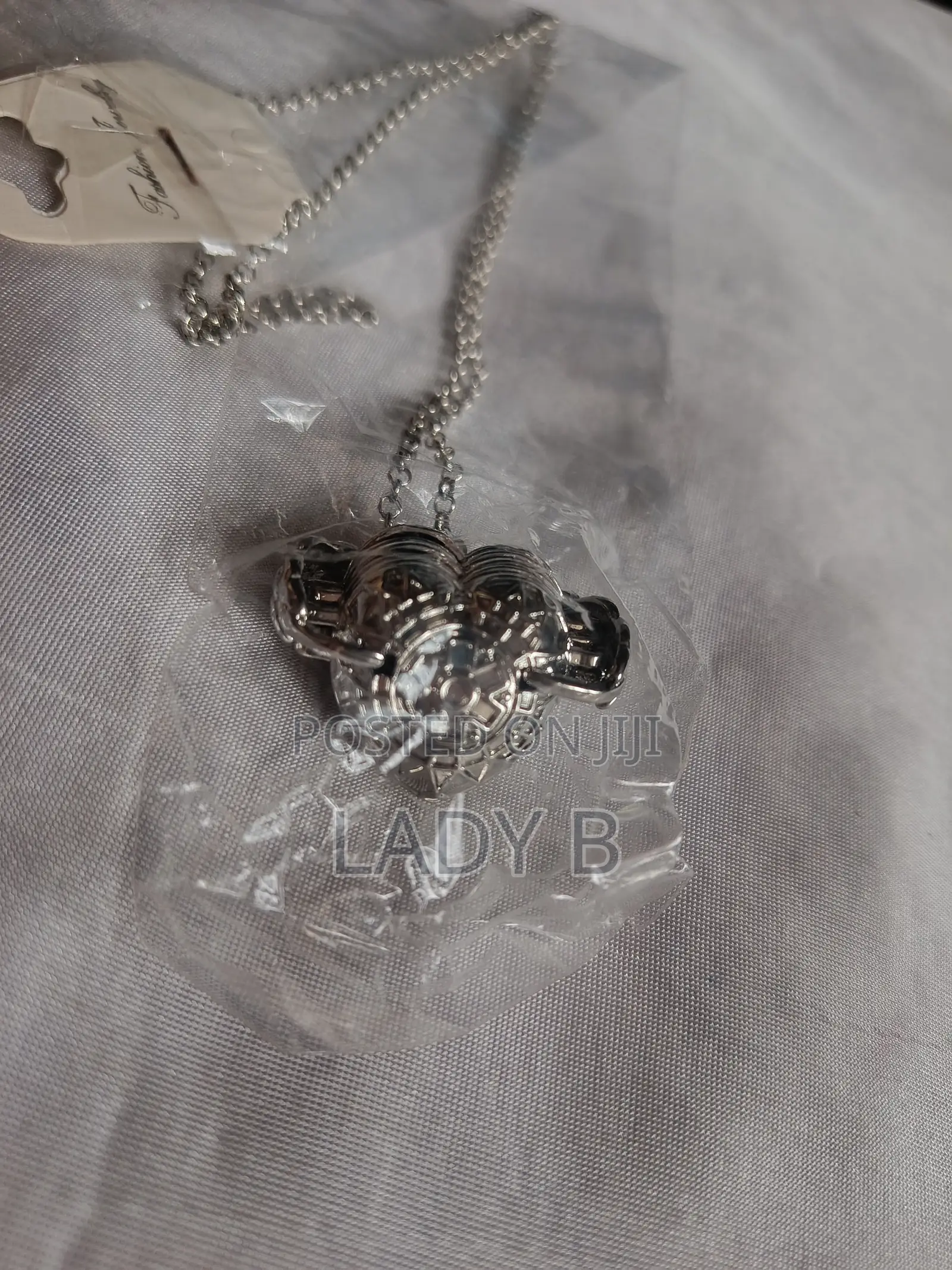 Silver Heart Shaped Vintage 4-Photo Folding Locket