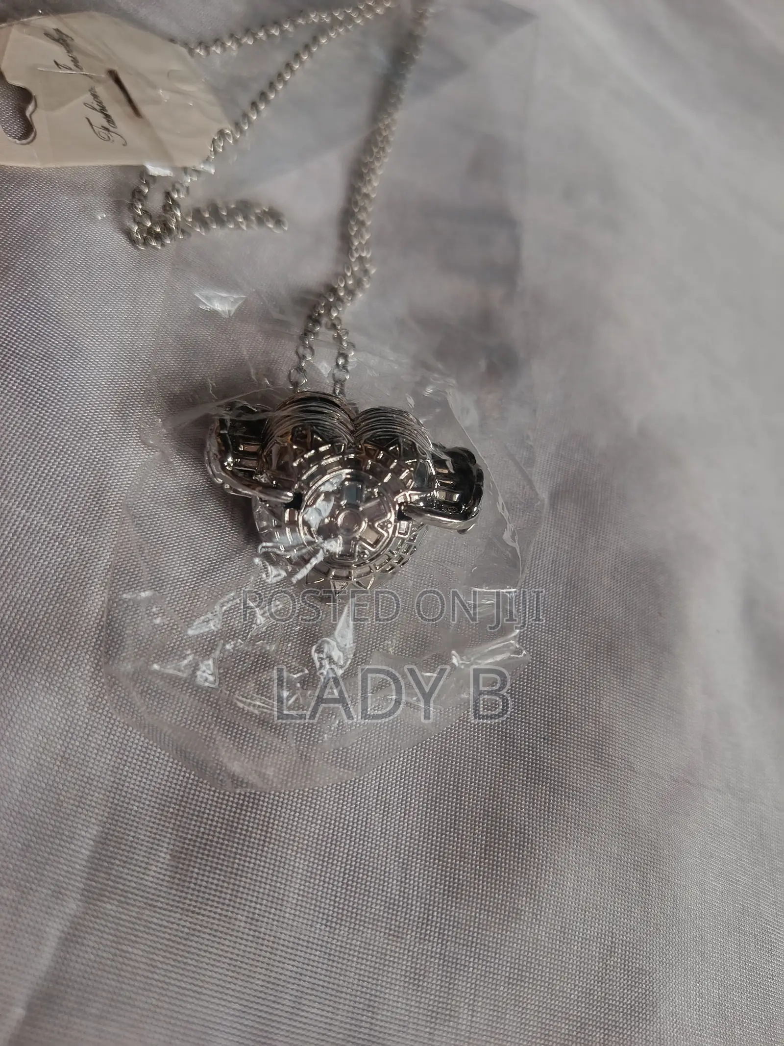 Silver Heart Shaped Vintage 4-Photo Folding Locket