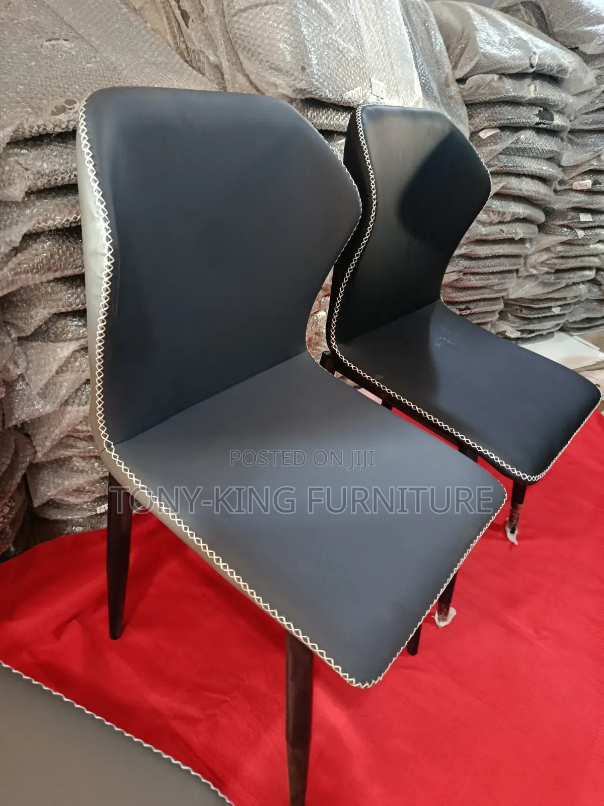 Modern Padded Leather Dining Chair Set With a High Curved Backrest