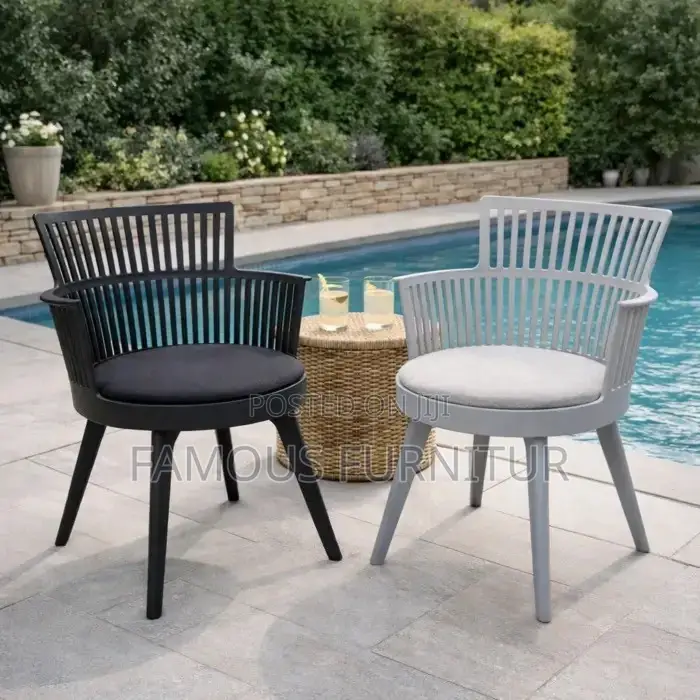 Modern Black Plastic Armchairs With Slatted Backrests and Cushioned