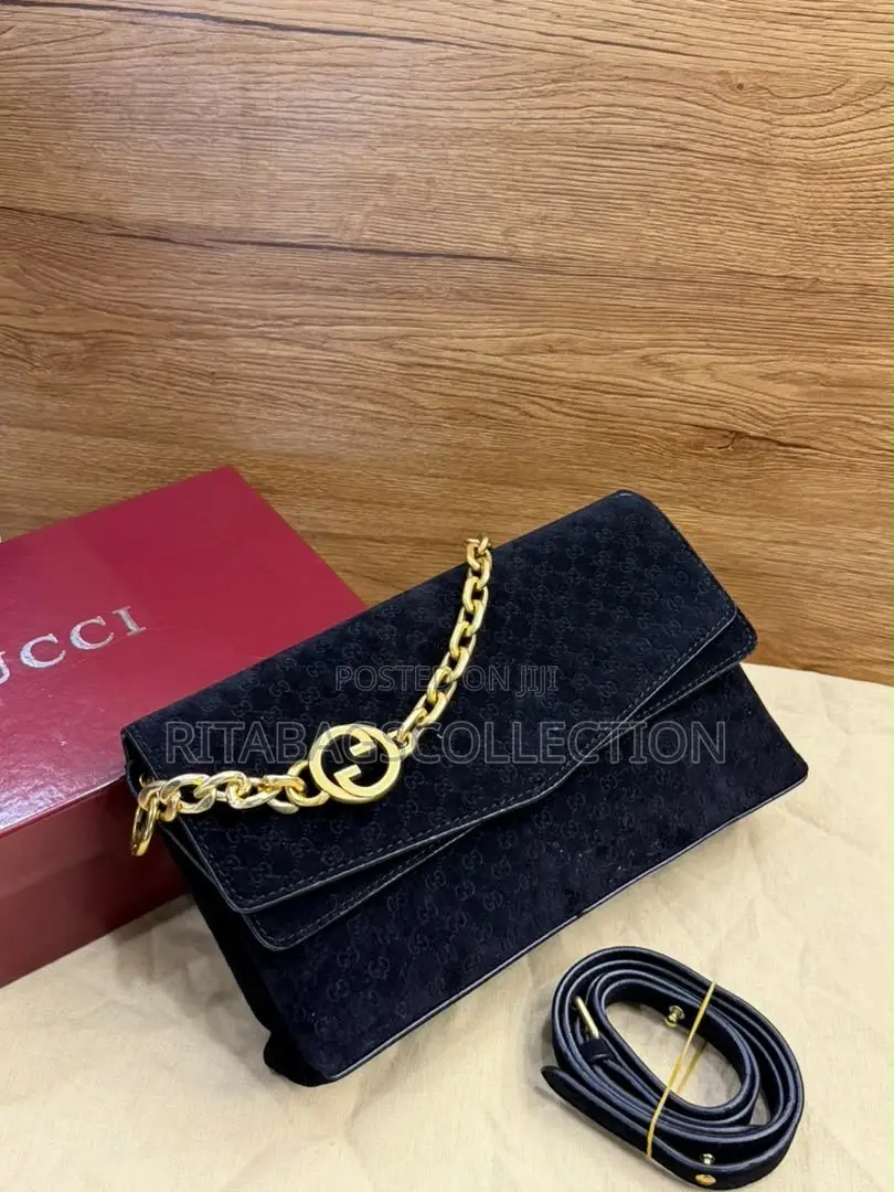 Gucci Medium Embossed Chain Shoulder Bag