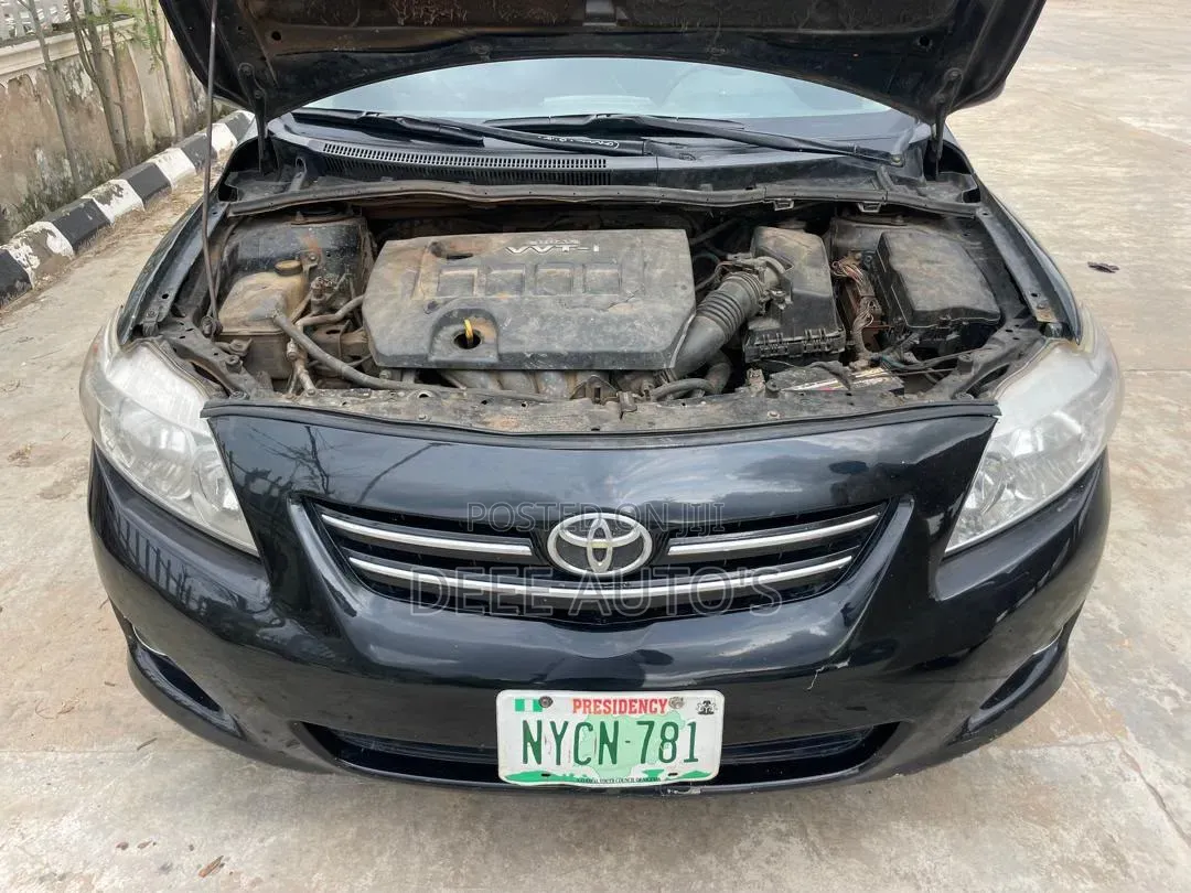 Toyota Corolla Base 4dr Sedan (1.8L 4cyl 5M) 2010 Black
