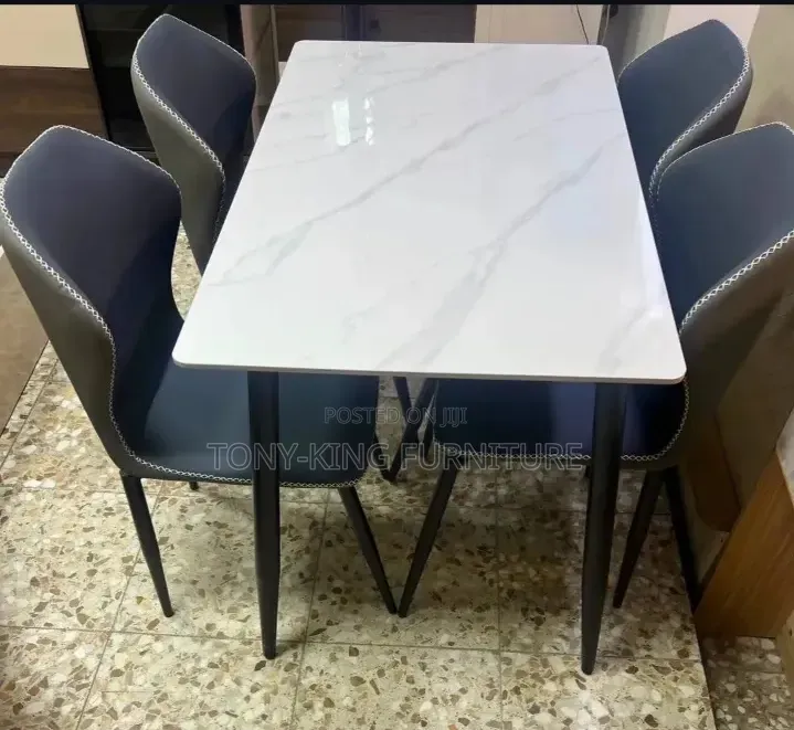Modern 6-Seater Dining Set Featuring a Grey Marble Top With Metal Leg