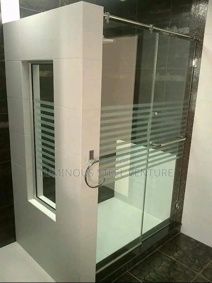 Spacious Look: Clear Glass Panels Let Light Flow Freely, Making Small