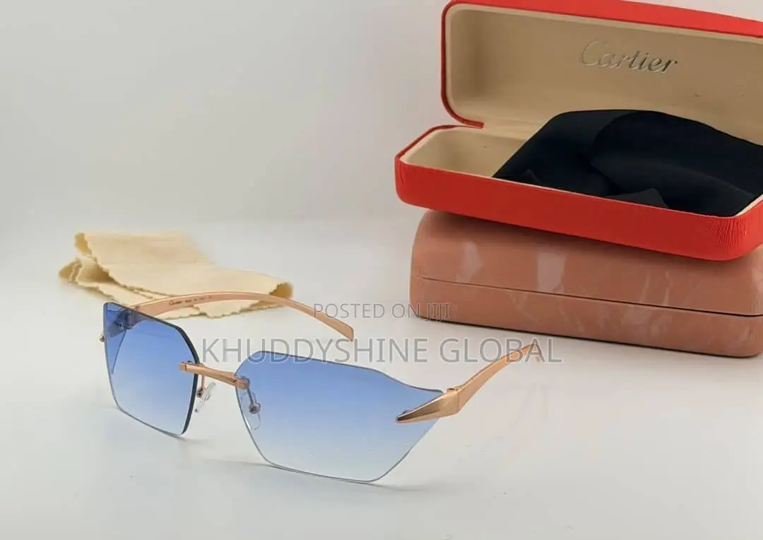 Rimless Luxury Sunglasses Featuring Grey Lenses and Distinct Animal
