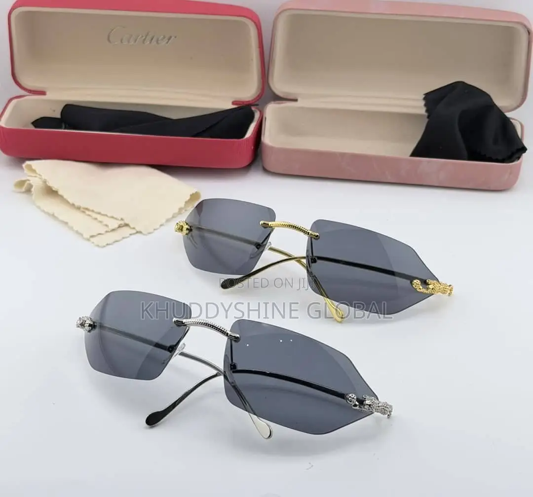 Rimless Luxury Sunglasses Featuring Grey Lenses and Distinct Animal