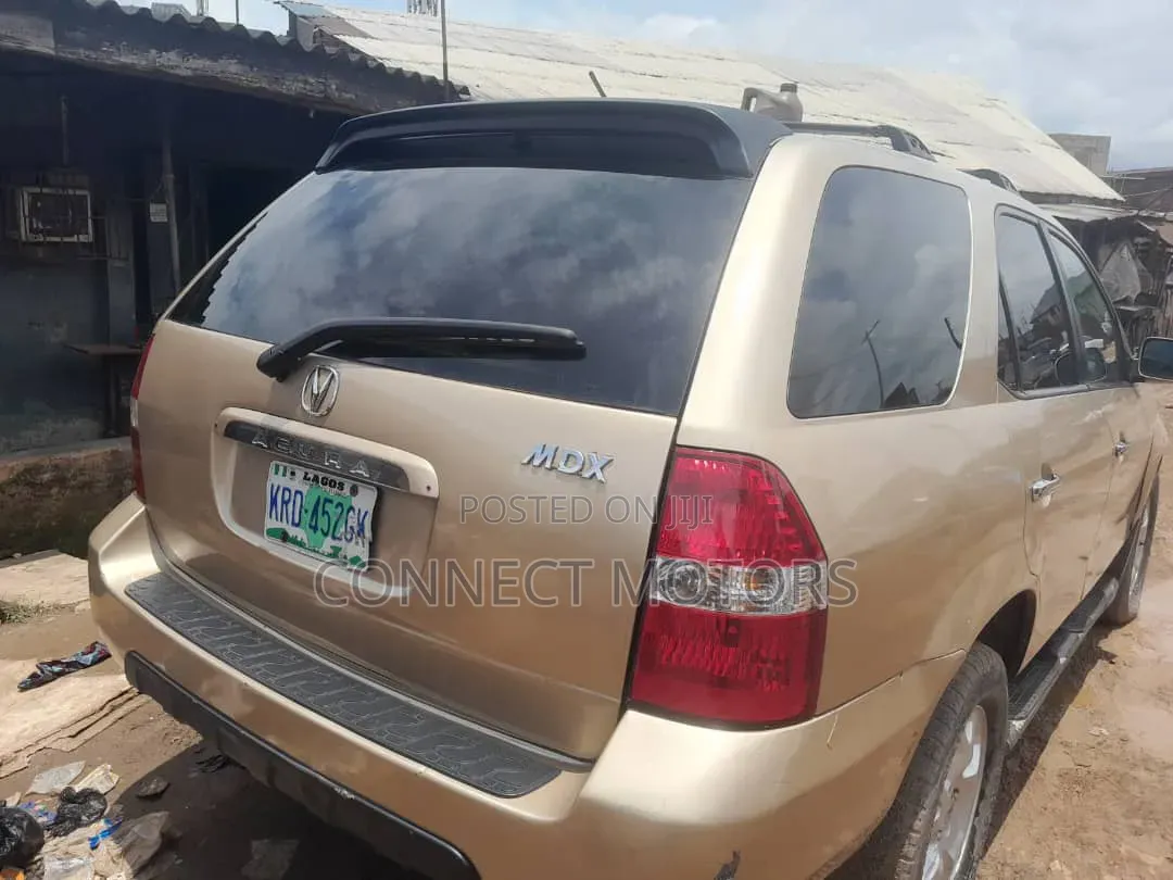 Acura MDX Touring 4dr SUV AWD (3.5L 6cyl 5A) 2006 Gold