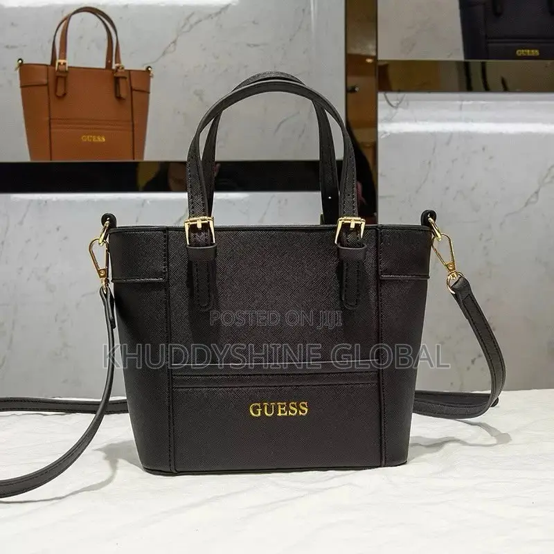 Top-Handle Guess Handbags Feature a Polished Gold-Tone Logo