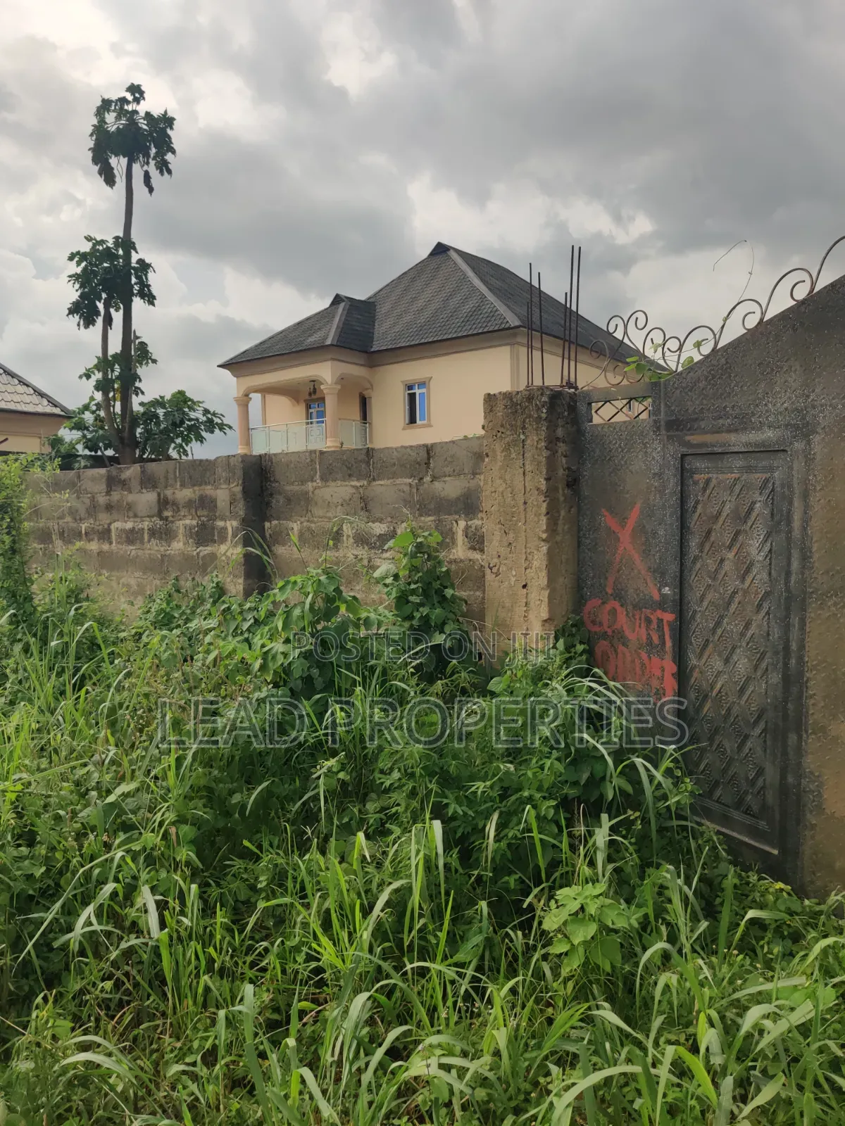 Half a Plot of Land for Sale in Alagbaka GRA Extension