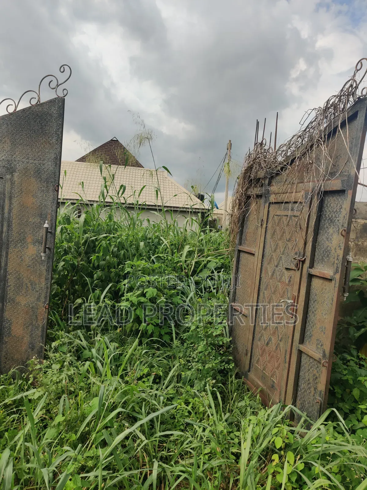 Half a Plot of Land for Sale in Alagbaka GRA Extension