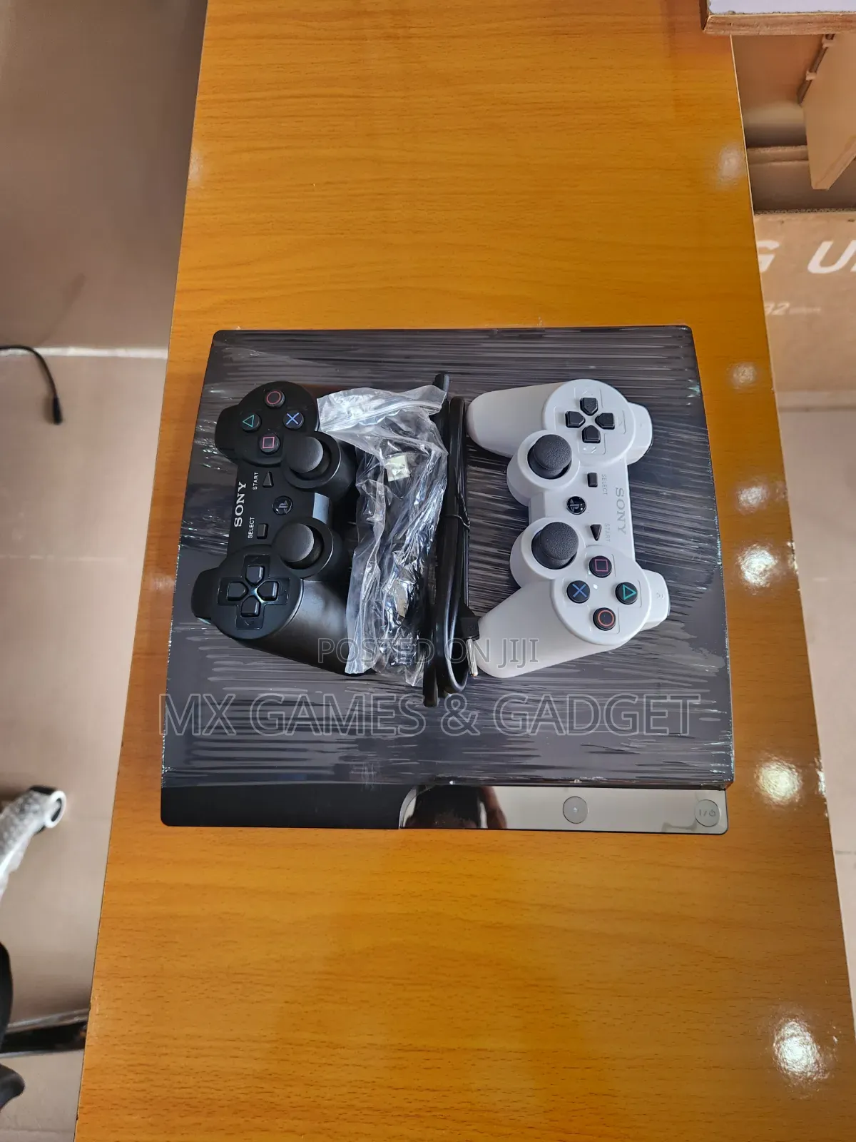 Playstation 3 Slim UK Use With 2 Pad and 10 Games Working Perfectly