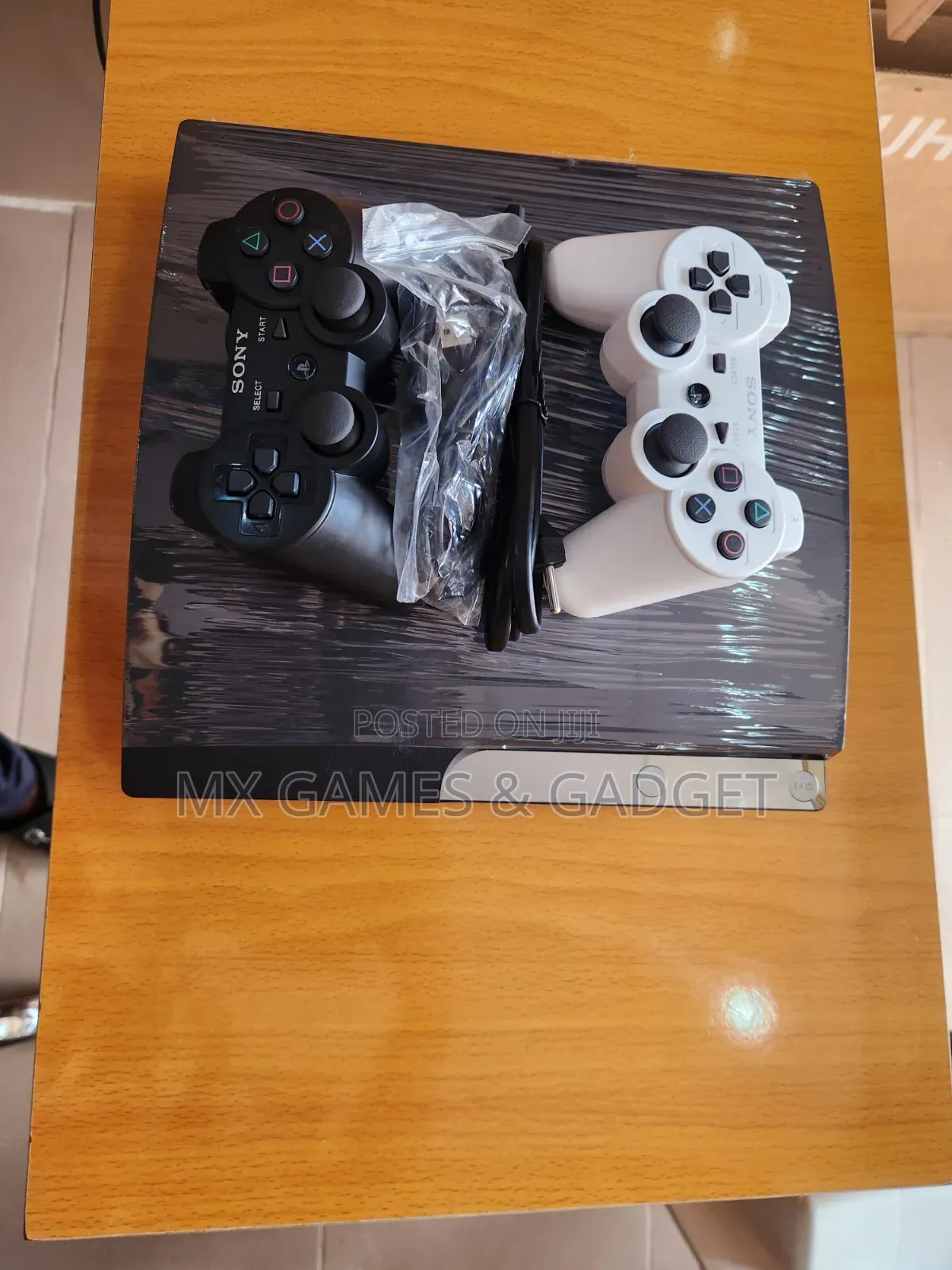 Playstation 3 Slim UK Use With 2 Pad and 10 Games Working Perfectly