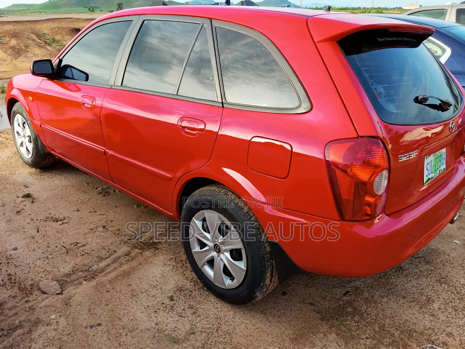 Mazda 323 2000 Red