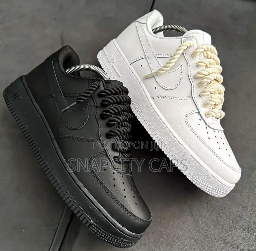 Original Nike Air Force 1 Sneakers. Available in Black and White