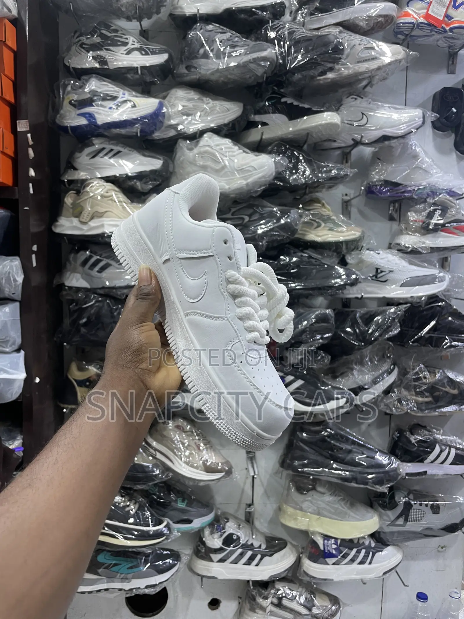 Original Nike Air Force 1 Sneakers. Available in Black and White