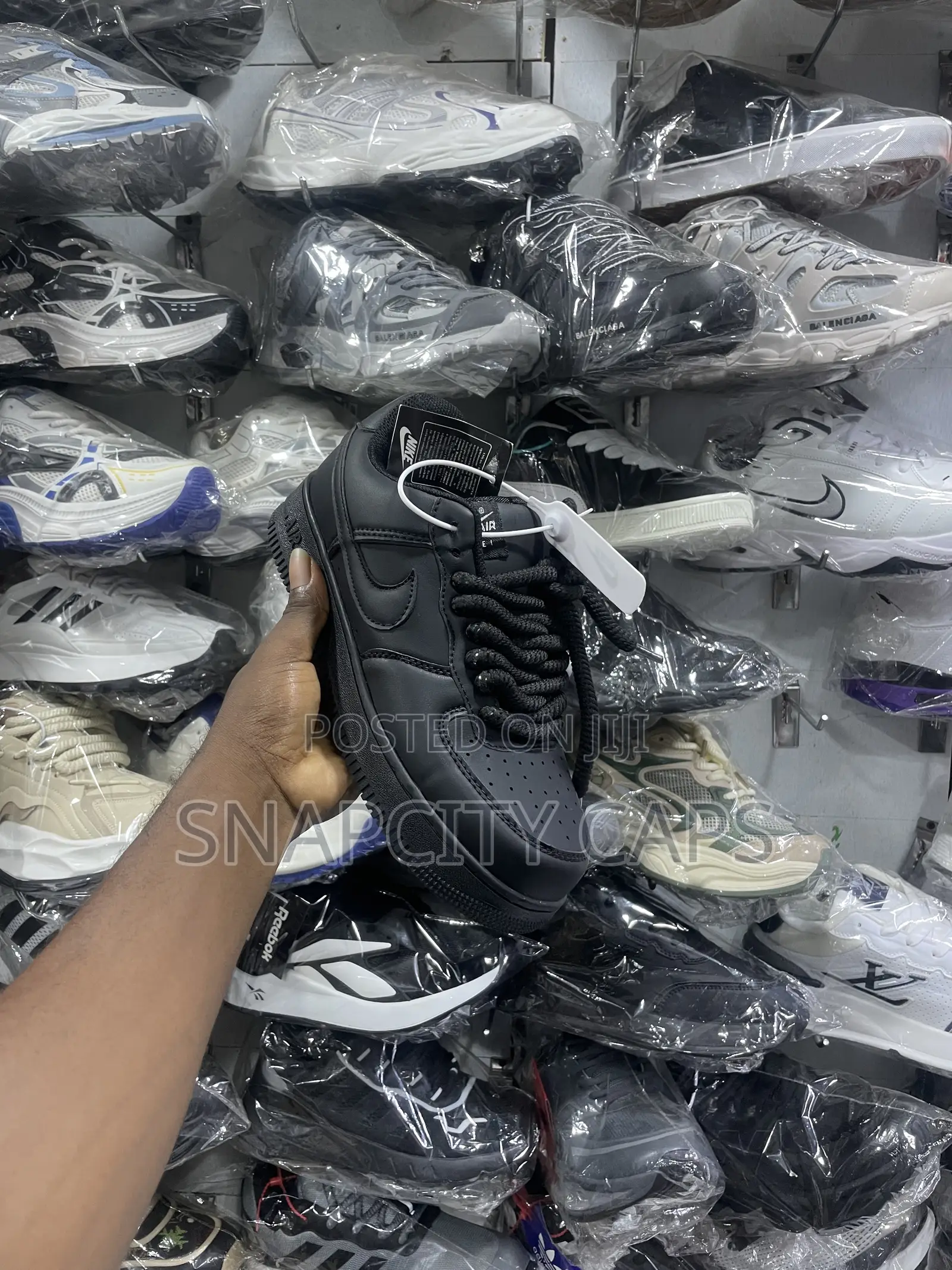 Original Nike Air Force 1 Sneakers. Available in Black and White