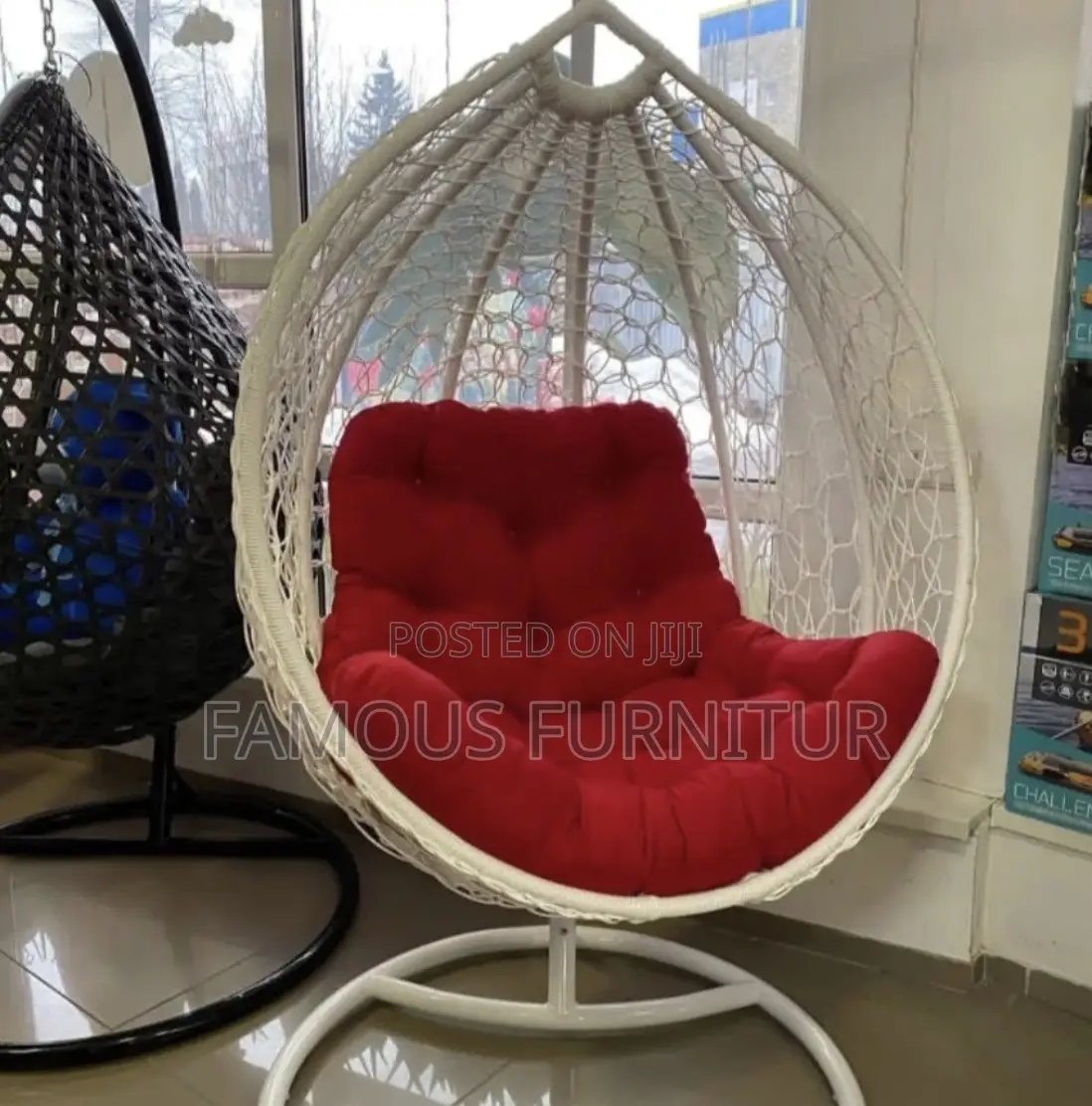 White Teardrop Hanging Egg Chair With an Intricate Woven Basket Design
