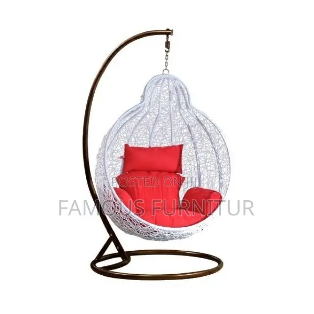 The Image Shows a Pair of Teardrop-Shaped Rattan Hanging Swing Chairs