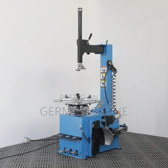Shows a Dentools Automatic Tyre Changer